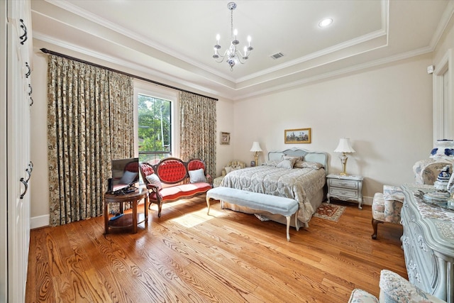 8518 Prichett Dr, Houston, TX 77096 - bedroom featuring a chandelier, wood finished floors, ornamental molding, and a raised ceiling