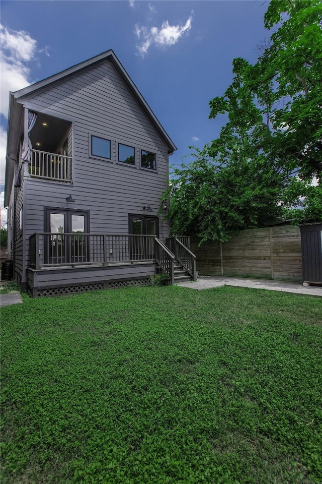 3323 Cornell St, Houston, TX 77022 - back of property featuring a deck and a patio