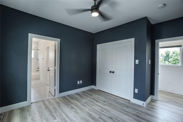 3323 Cornell St, Houston, TX 77022 - unfurnished bedroom with wood finished floors, a closet, ceiling fan, and ensuite bathroom
