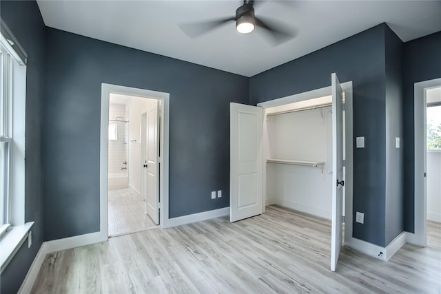 3323 Cornell St, Houston, TX 77022 - unfurnished bedroom with wood finished floors, a closet, ensuite bathroom, and a ceiling fan