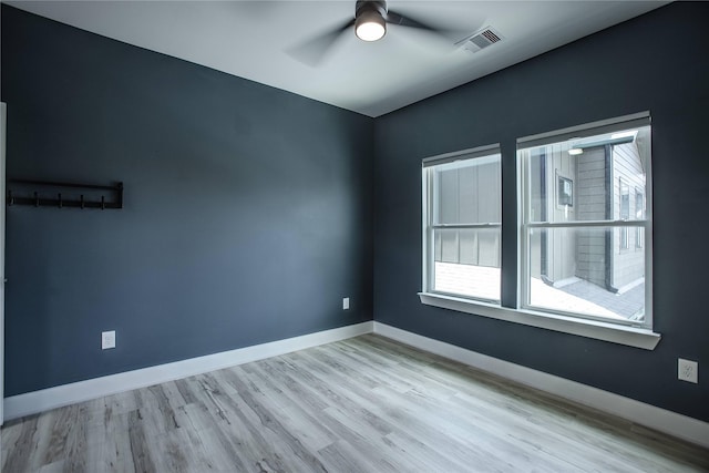 3323 Cornell St, Houston, TX 77022 - spare room with ceiling fan and wood finished floors