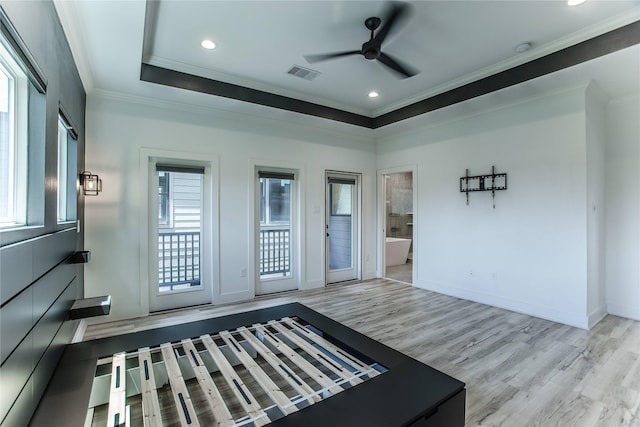 3323 Cornell St, Houston, TX 77022 - interior space with a ceiling fan, wood finished floors, crown molding, recessed lighting, and a raised ceiling
