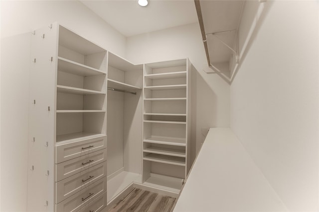 3323 Cornell St, Houston, TX 77022 - walk in closet featuring light wood-type flooring