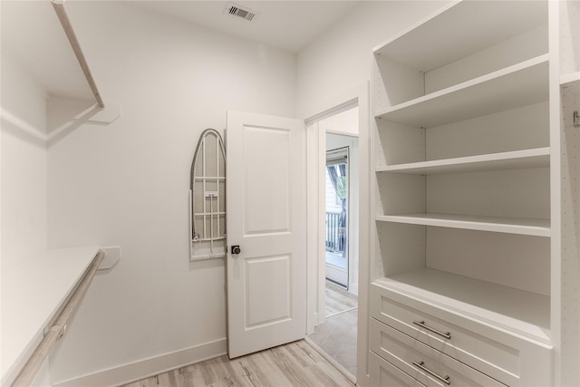 3323 Cornell St, Houston, TX 77022 - walk in closet featuring light wood-type flooring