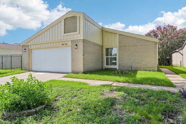 6315 Dellfern Dr, Houston, TX 77035 - view of front of property with brick siding, concrete driveway, board and batten siding, and an attached garage