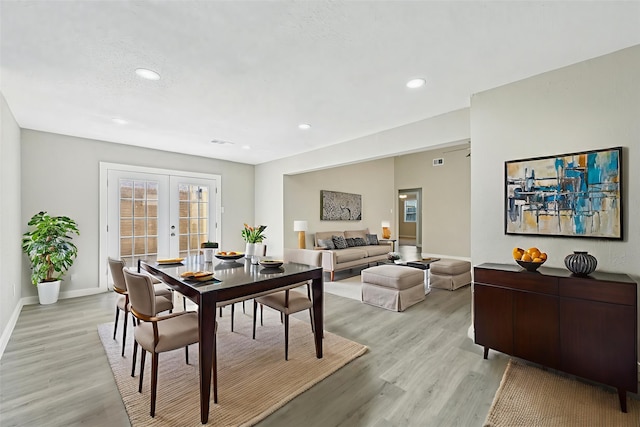 6315 Dellfern Dr, Houston, TX 77035 - dining room featuring light wood-style floors, recessed lighting, and french doors