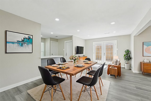 6315 Dellfern Dr, Houston, TX 77035 - dining area with french doors, light wood-style flooring, and recessed lighting
