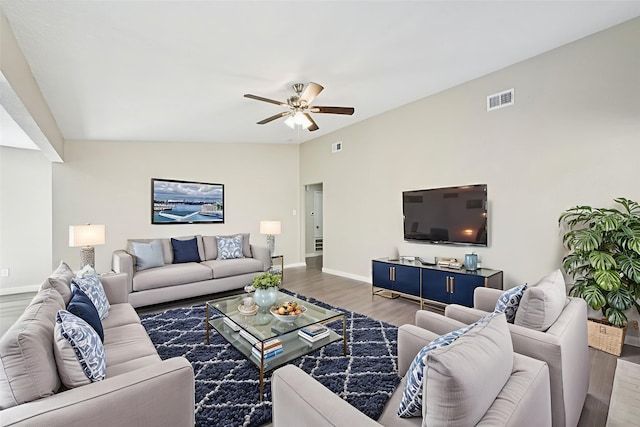 6315 Dellfern Dr, Houston, TX 77035 - living room featuring ceiling fan, wood finished floors, and vaulted ceiling