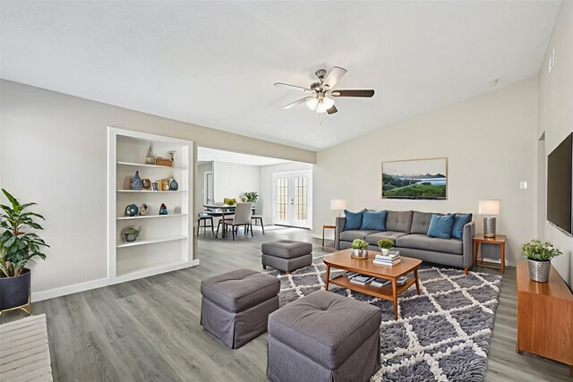 6315 Dellfern Dr, Houston, TX 77035 - living area featuring ceiling fan, wood finished floors, and lofted ceiling