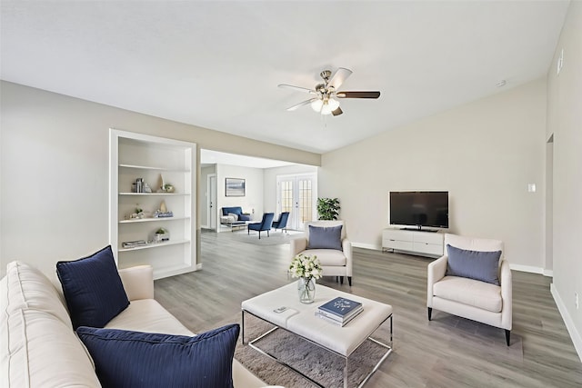 6315 Dellfern Dr, Houston, TX 77035 - living room featuring a ceiling fan, french doors, and wood finished floors