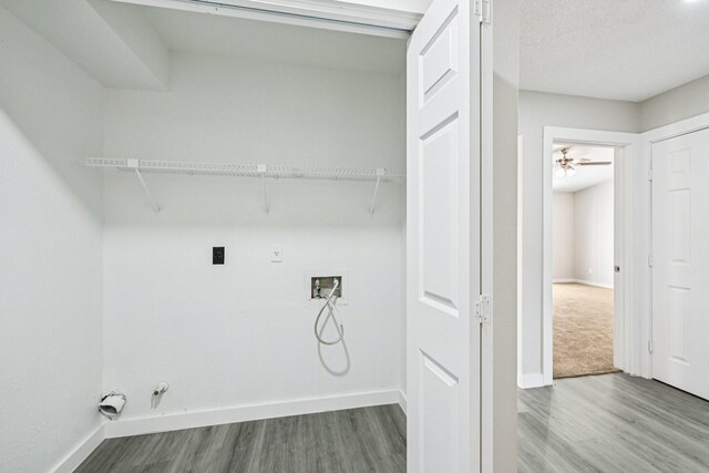 6315 Dellfern Dr, Houston, TX 77035 - laundry room with gas dryer hookup, wood finished floors, and hookup for a washing machine