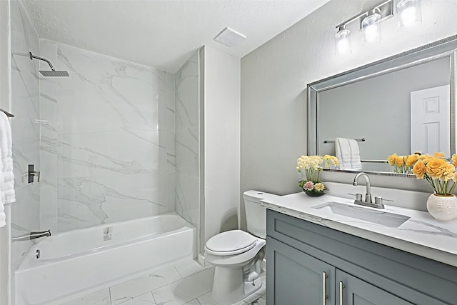 6315 Dellfern Dr, Houston, TX 77035 - full bath featuring vanity, shower / bathtub combination, marble look tile flooring, and a textured ceiling