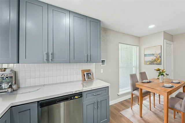 6315 Dellfern Dr, Houston, TX 77035 - kitchen featuring dishwasher, light wood finished floors, gray cabinetry, decorative backsplash, and recessed lighting