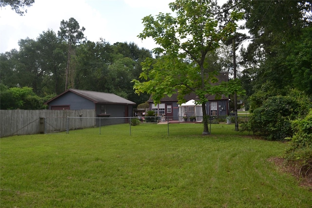 11014 Indian Trails Dr, Tomball, TX 77375 - view of yard featuring a detached garage