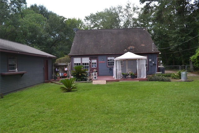 11014 Indian Trails Dr, Tomball, TX 77375 - rear view of house featuring a gazebo and a deck