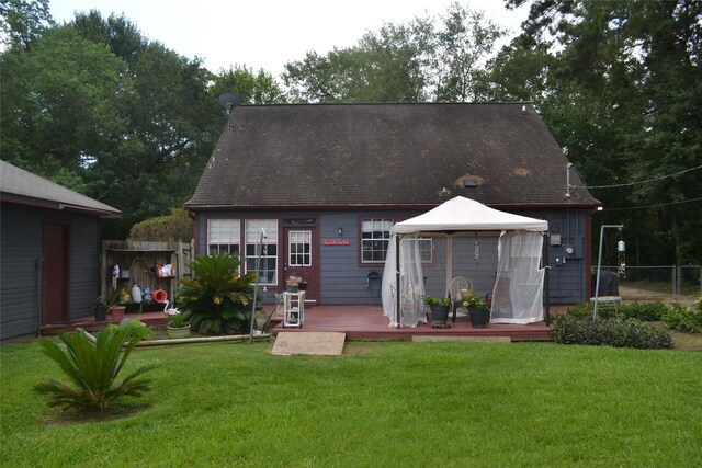 11014 Indian Trails Dr, Tomball, TX 77375 - rear view of property with a gazebo and a wooden deck