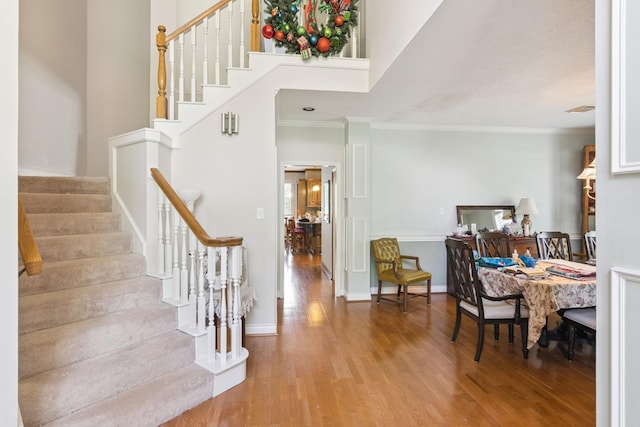 8414 Atascocita Lake Way, Humble, TX 77346 - foyer with wood finished floors, stairway, ornamental molding, and a towering ceiling