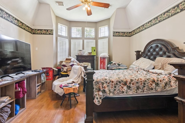 8414 Atascocita Lake Way, Humble, TX 77346 - bedroom with wood finished floors and ceiling fan
