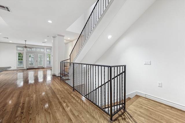 709 Lester St, Houston, TX 77007 - staircase with wood finished floors, recessed lighting, and a ceiling fan