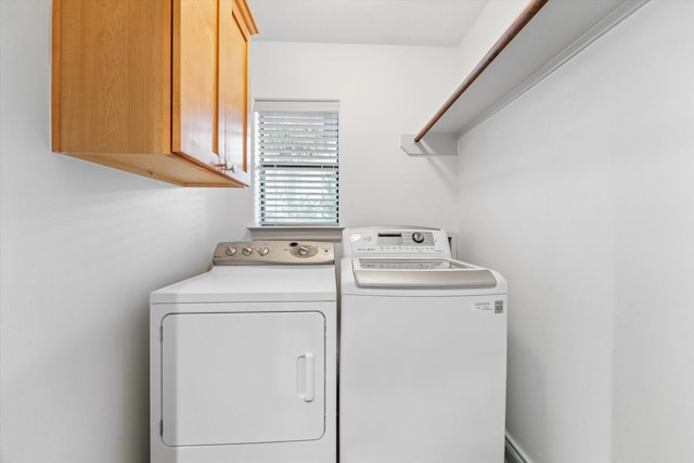 709 Lester St, Houston, TX 77007 - laundry area featuring cabinet space and independent washer and dryer