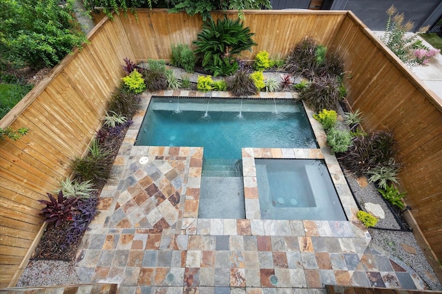 709 Lester St, Houston, TX 77007 - view of pool featuring an in-ground hot tub and a fenced backyard