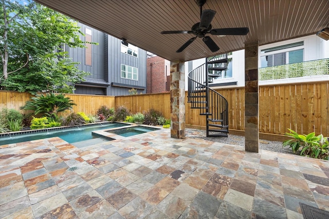 709 Lester St, Houston, TX 77007 - fenced backyard featuring stairs, an in-ground hot tub, ceiling fan, and a patio area