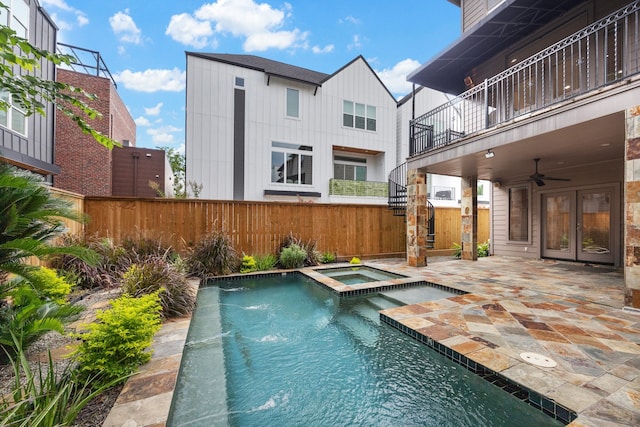 709 Lester St, Houston, TX 77007 - view of pool with a fenced backyard, ceiling fan, a patio, a pool with connected hot tub, and french doors