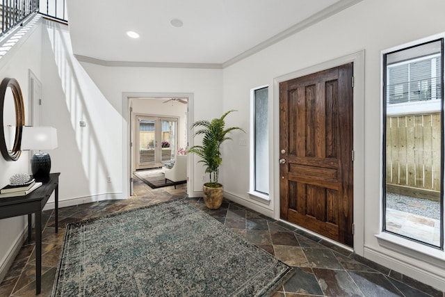 709 Lester St, Houston, TX 77007 - entrance foyer with stone tile flooring, ornamental molding, a ceiling fan, and recessed lighting