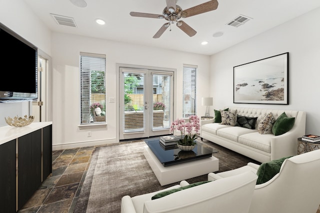 709 Lester St, Houston, TX 77007 - living room featuring stone tile flooring, recessed lighting, and a ceiling fan