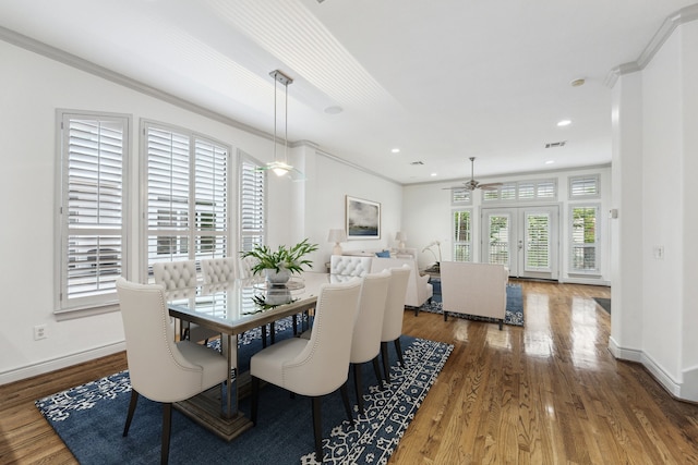 709 Lester St, Houston, TX 77007 - dining area featuring wood finished floors, ceiling fan, recessed lighting, and crown molding