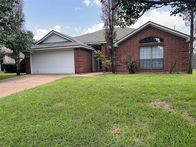 9412 Riviera Dr, Waco, TX 76712 - ranch-style house with driveway, an attached garage, brick siding, and a front yard