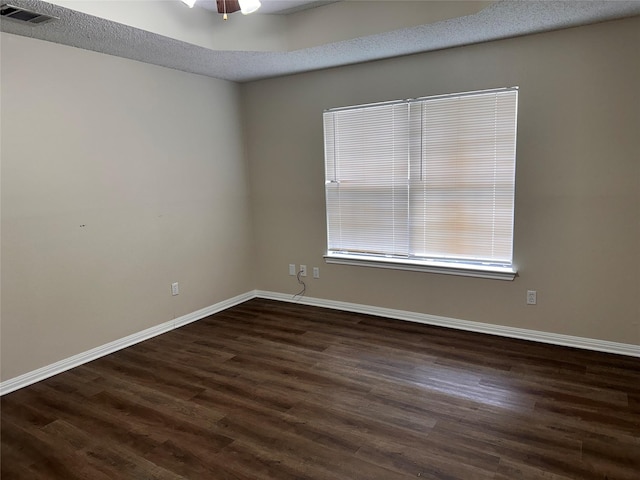 9412 Riviera Dr, Waco, TX 76712 - empty room with dark wood finished floors and a ceiling fan