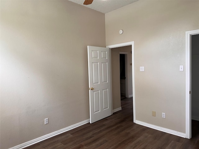 9412 Riviera Dr, Waco, TX 76712 - spare room with dark wood finished floors and a ceiling fan