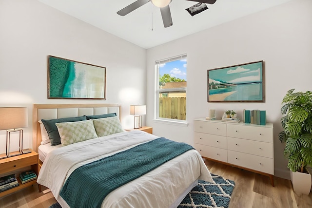 6321 Joe Louis Ln, Houston, TX 77091 - bedroom with wood finished floors and ceiling fan