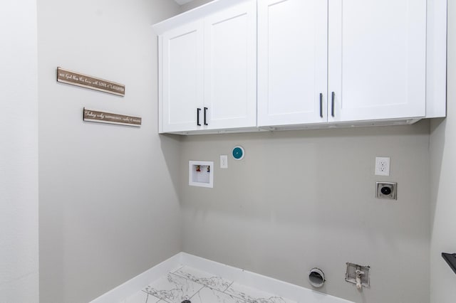 4910 Wunder Way, Houston, TX 77069 - laundry area featuring hookup for a gas dryer, electric dryer hookup, cabinet space, and marble finish flooring