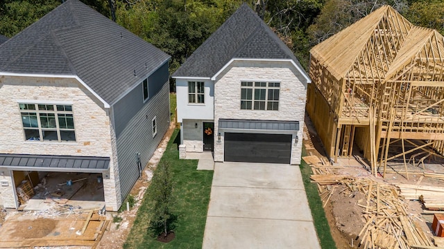 4910 Wunder Way, Houston, TX 77069 - view of front facade featuring stone siding, a garage, driveway, and a shingled roof