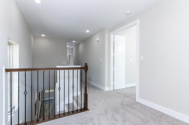 4910 Wunder Way, Houston, TX 77069 - hall featuring carpet flooring, an upstairs landing, and recessed lighting