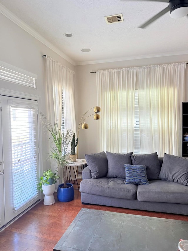 3204 Garden Oaks Vw, Houston, TX 77018 - living area with crown molding, ceiling fan, and wood finished floors