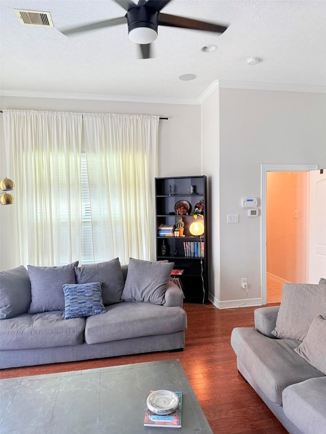 3204 Garden Oaks Vw, Houston, TX 77018 - living room featuring ceiling fan, crown molding, and wood finished floors