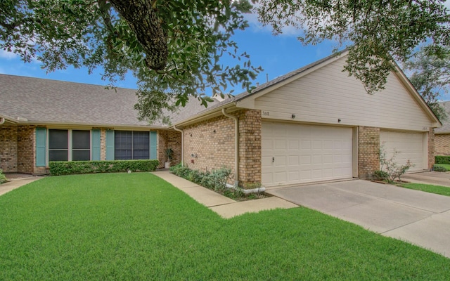 3618 Teakwood Ln, Pearland, TX 77584 - view of front facade with a front lawn, brick siding, concrete driveway, an attached garage, and a shingled roof