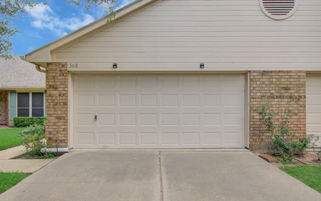 3618 Teakwood Ln, Pearland, TX 77584 - garage with concrete driveway