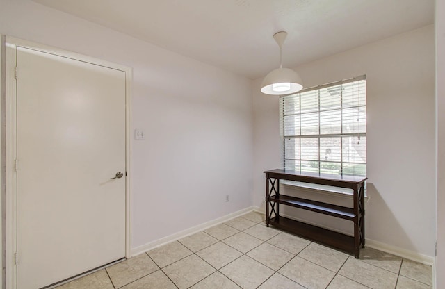 3618 Teakwood Ln, Pearland, TX 77584 - unfurnished room with light tile patterned flooring and baseboards