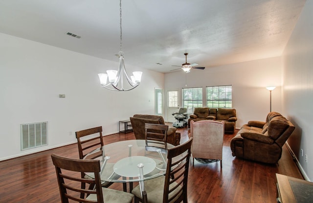 3618 Teakwood Ln, Pearland, TX 77584 - dining space featuring dark wood-style flooring, a chandelier, and a ceiling fan