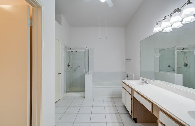 3618 Teakwood Ln, Pearland, TX 77584 - bathroom featuring tile patterned floors, a shower stall, a garden tub, and double vanity