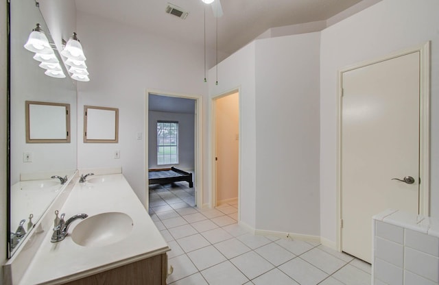 3618 Teakwood Ln, Pearland, TX 77584 - full bathroom with double vanity, tile patterned floors, and a chandelier