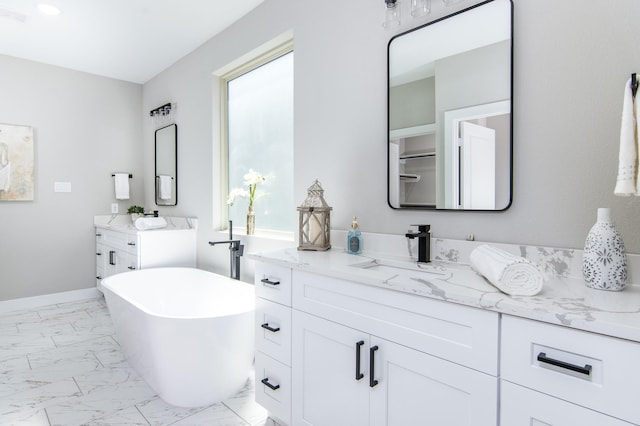 15034 Wunderlust Ln, Houston, TX 77069 - full bathroom with marble look tiles, vanity, and a soaking tub