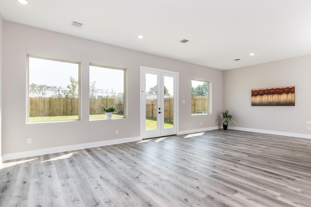 15034 Wunderlust Ln, Houston, TX 77069 - unfurnished room with french doors, recessed lighting, and wood finished floors