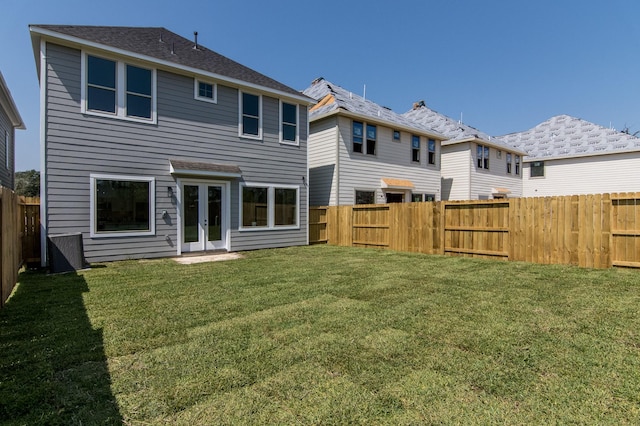 15034 Wunderlust Ln, Houston, TX 77069 - back of property featuring french doors and a fenced backyard
