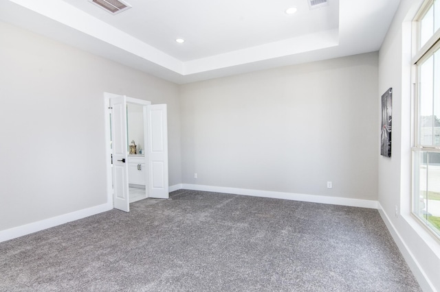 15034 Wunderlust Ln, Houston, TX 77069 - unfurnished room featuring dark colored carpet, recessed lighting, and a tray ceiling