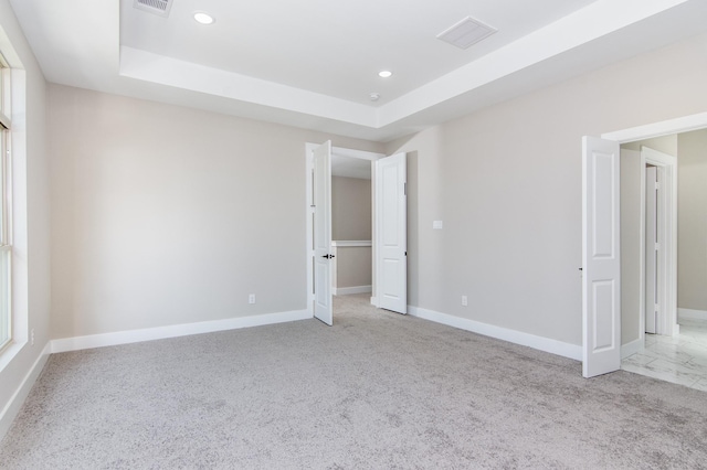 15034 Wunderlust Ln, Houston, TX 77069 - unfurnished bedroom with recessed lighting, a tray ceiling, and carpet